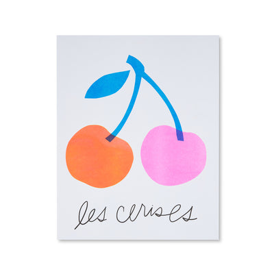 bright red and blue cherries with french wording