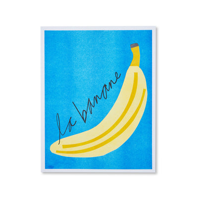 bright blue and yellow banana with french wording