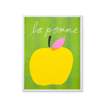 bright green and yellow apple with french wording
