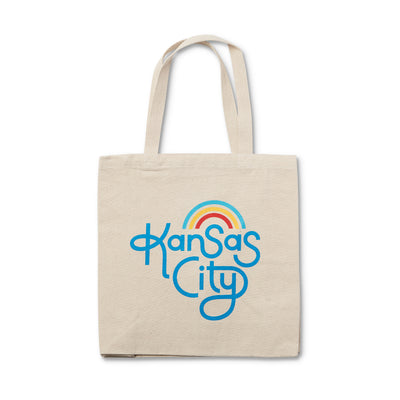 canvas tote with blue kansas city hand lettering and rainbow