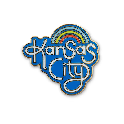 navy die cut enamel pin with kansas city hand lettering and rainbow