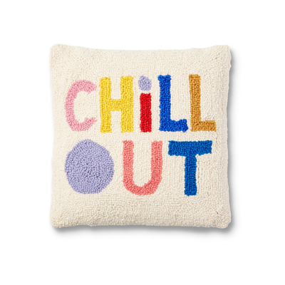 white hook pillow with colorful letters that read chill out