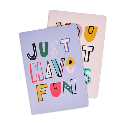 set of two notebooks with colorful doodles reading just have fun and you got this